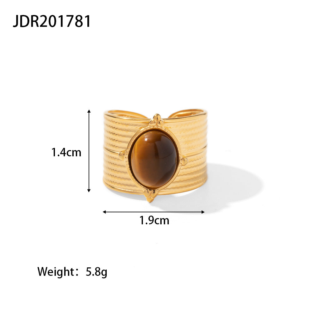Gold plated gemstone ring with minimalist adjustable band and geometric star detail
