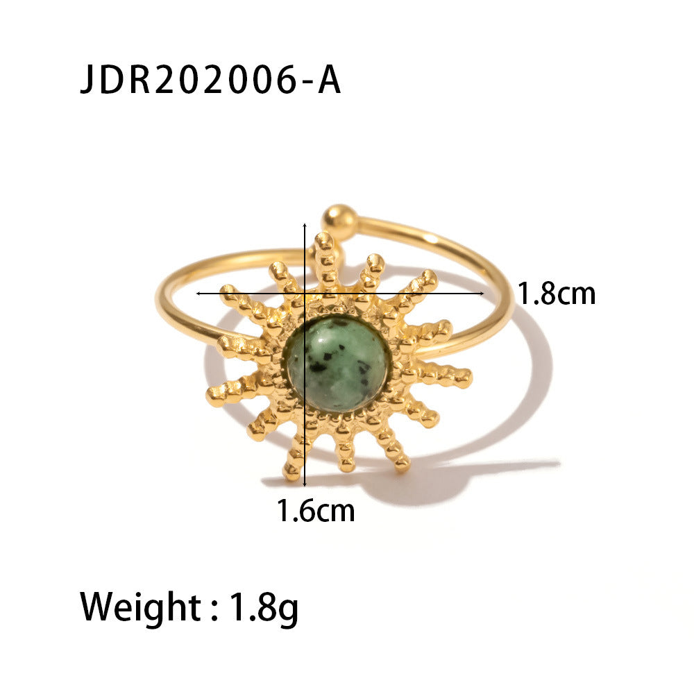 Gold plated gemstone ring with minimalist adjustable band and geometric star detail