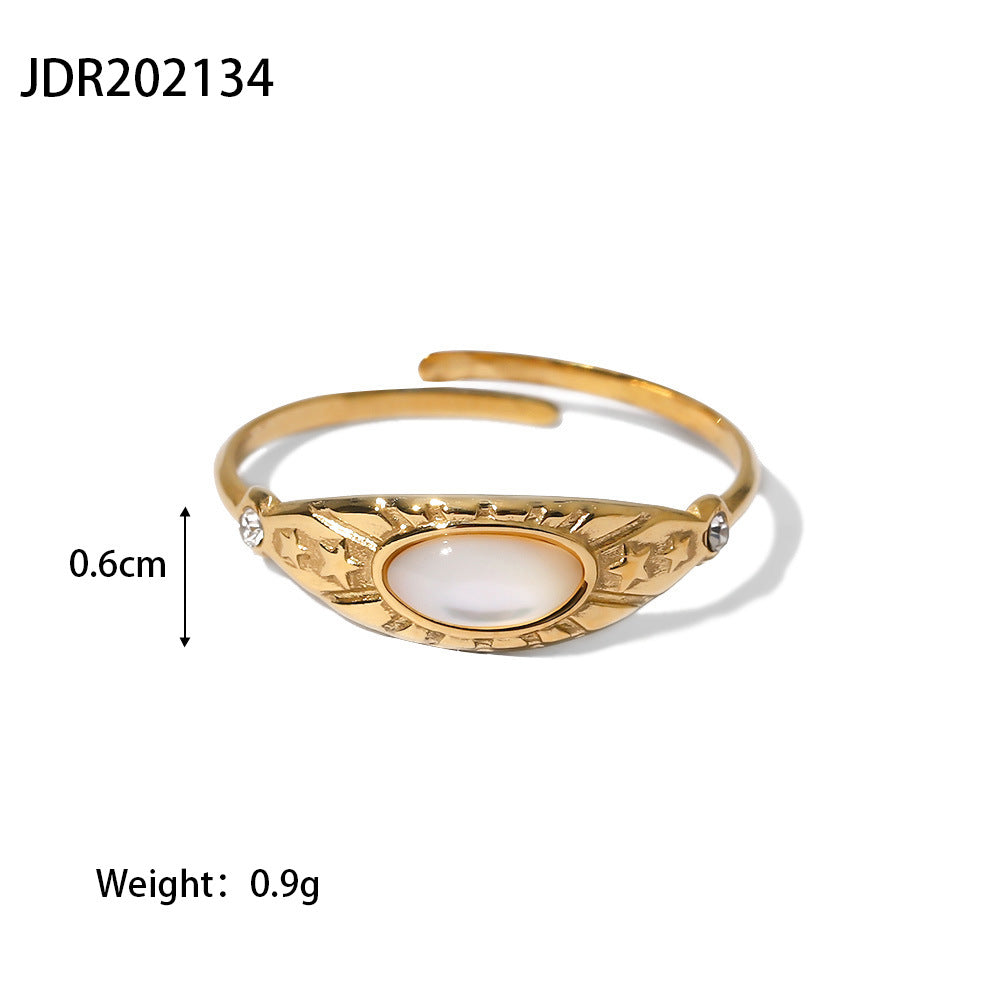Gold plated gemstone ring with minimalist adjustable band and geometric star detail