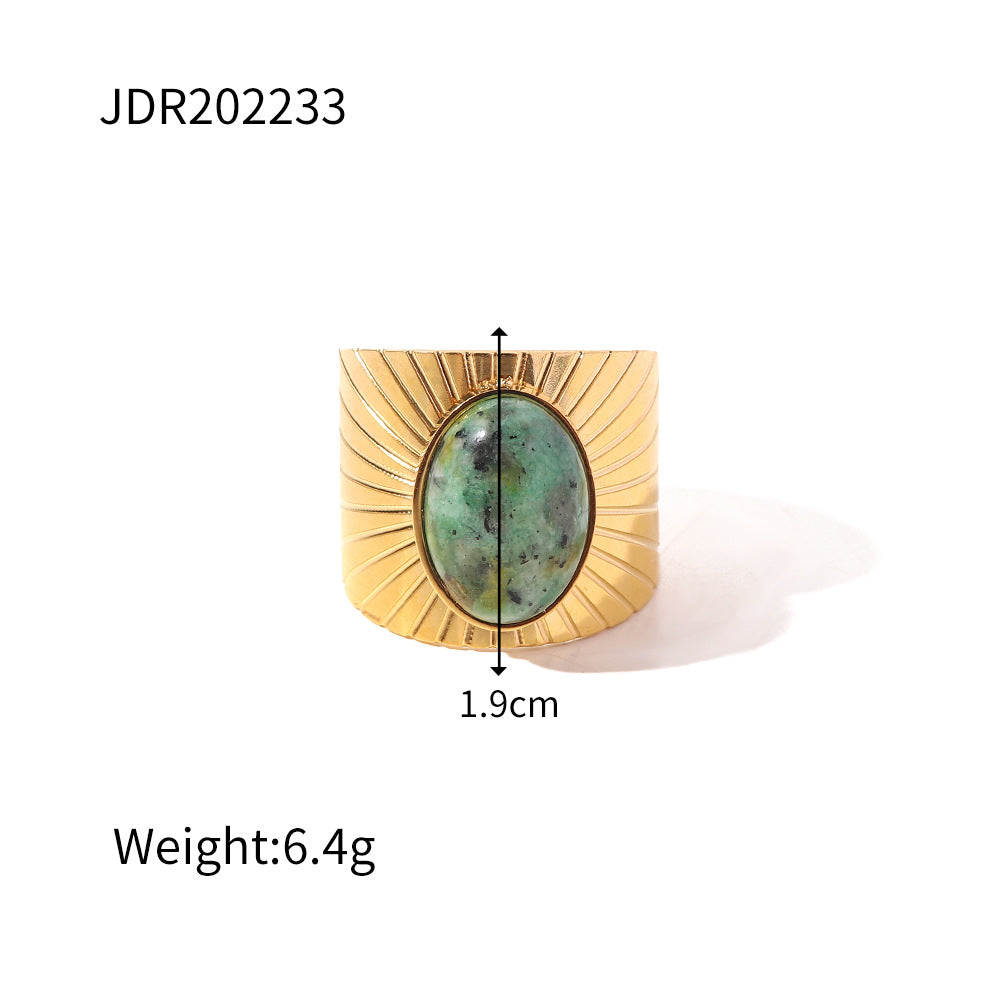 Gold plated gemstone ring with minimalist adjustable band and geometric star detail