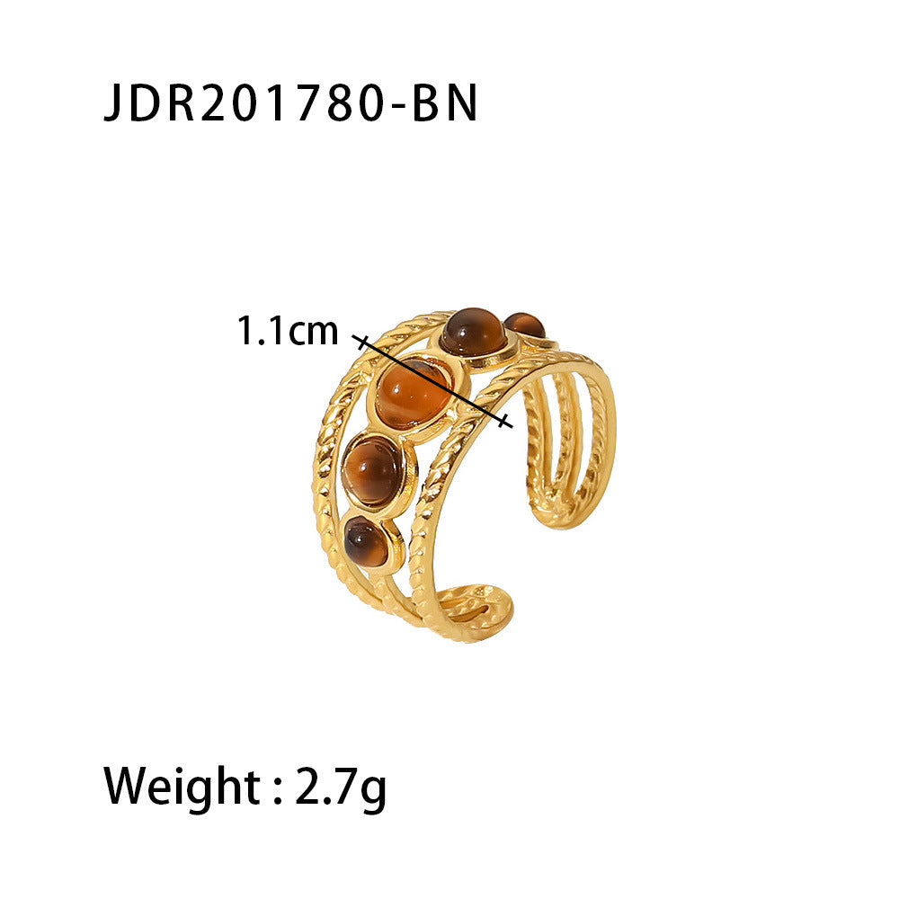 Gold plated gemstone ring with minimalist adjustable band and geometric star detail