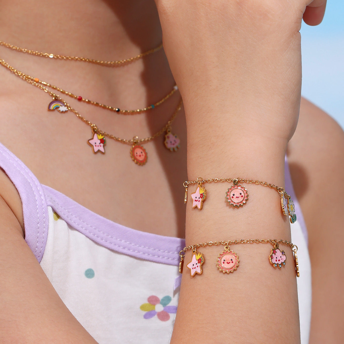 Gold plated kids jewelry set with sun and star necklace and matching bracelet for children
