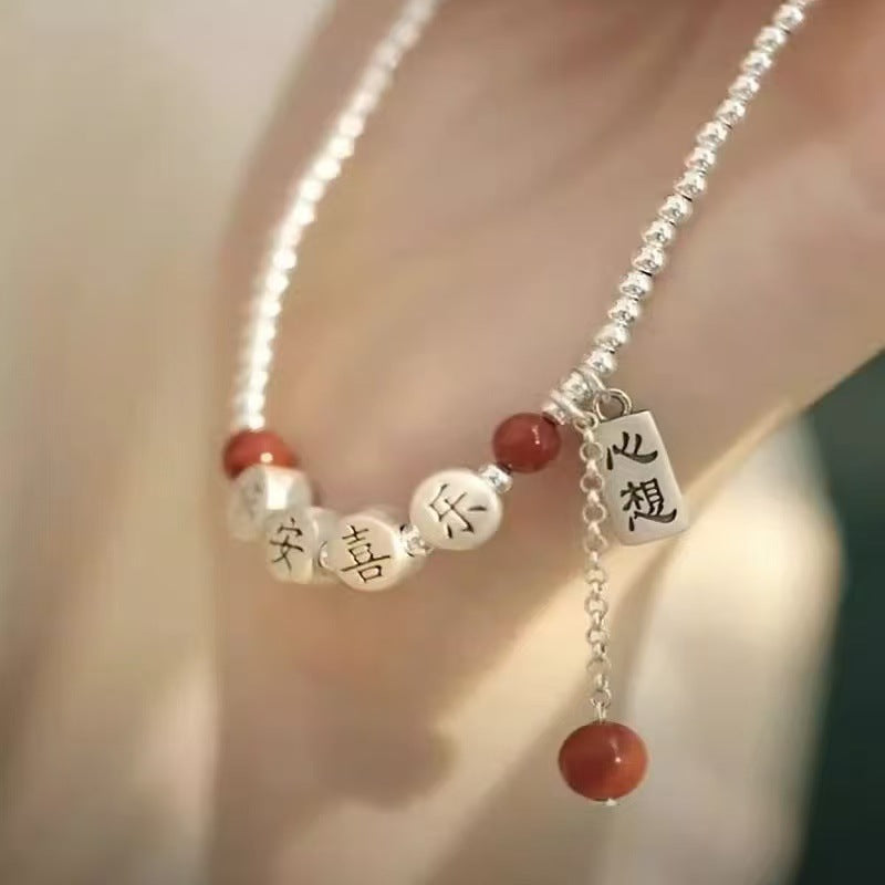 Silver peace happiness anklet with diamond-shaped details and elegant minimalist design