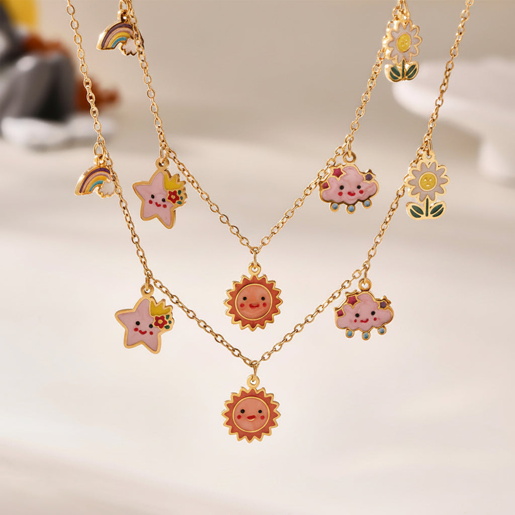 Gold plated kids jewelry set with sun and star necklace and matching bracelet for children