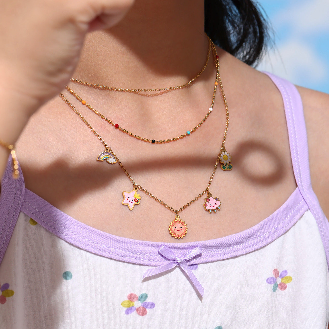 Gold plated kids jewelry set with sun and star necklace and matching bracelet for children