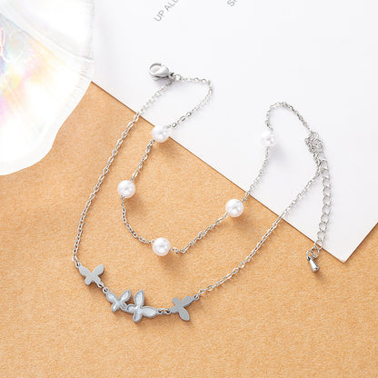 Gold plated butterfly anklet with pearl beads and double-layer chain design for women