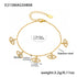 Gold plated zircon bracelet set with starburst chain links and sparkling stone accents