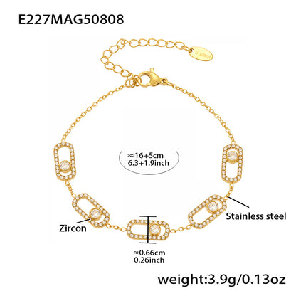 Gold plated zircon bracelet set with starburst chain links and sparkling stone accents