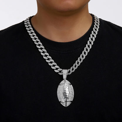 Gold plated football pendant necklace with iced out rhinestone design and hip hop chain style