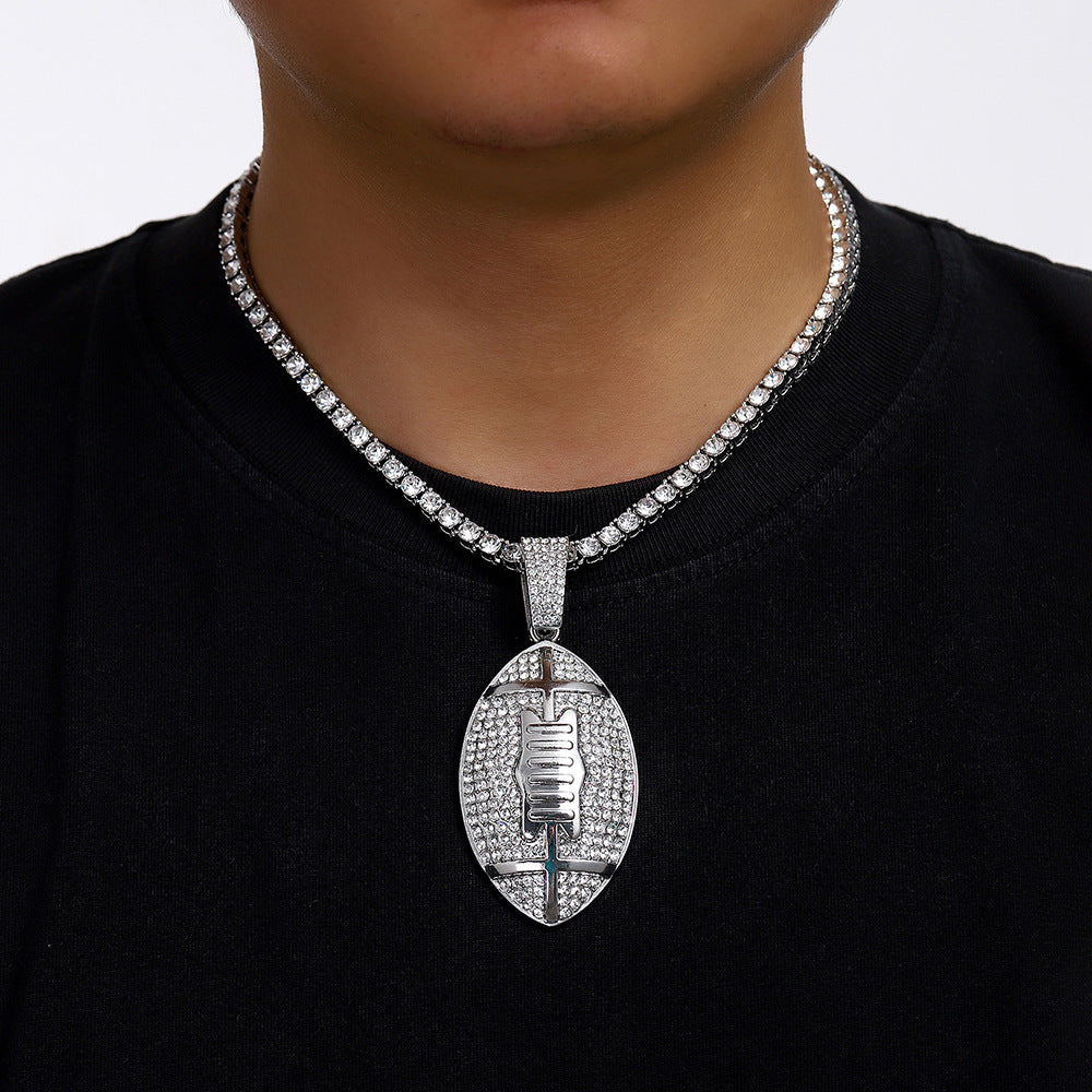 Gold plated football pendant necklace with iced out rhinestone design and hip hop chain style