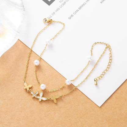 Gold plated butterfly anklet with pearl beads and double-layer chain design for women