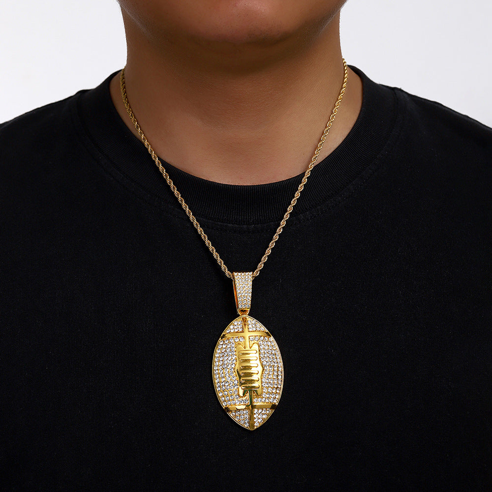 Gold plated football pendant necklace with iced out rhinestone design and hip hop chain style