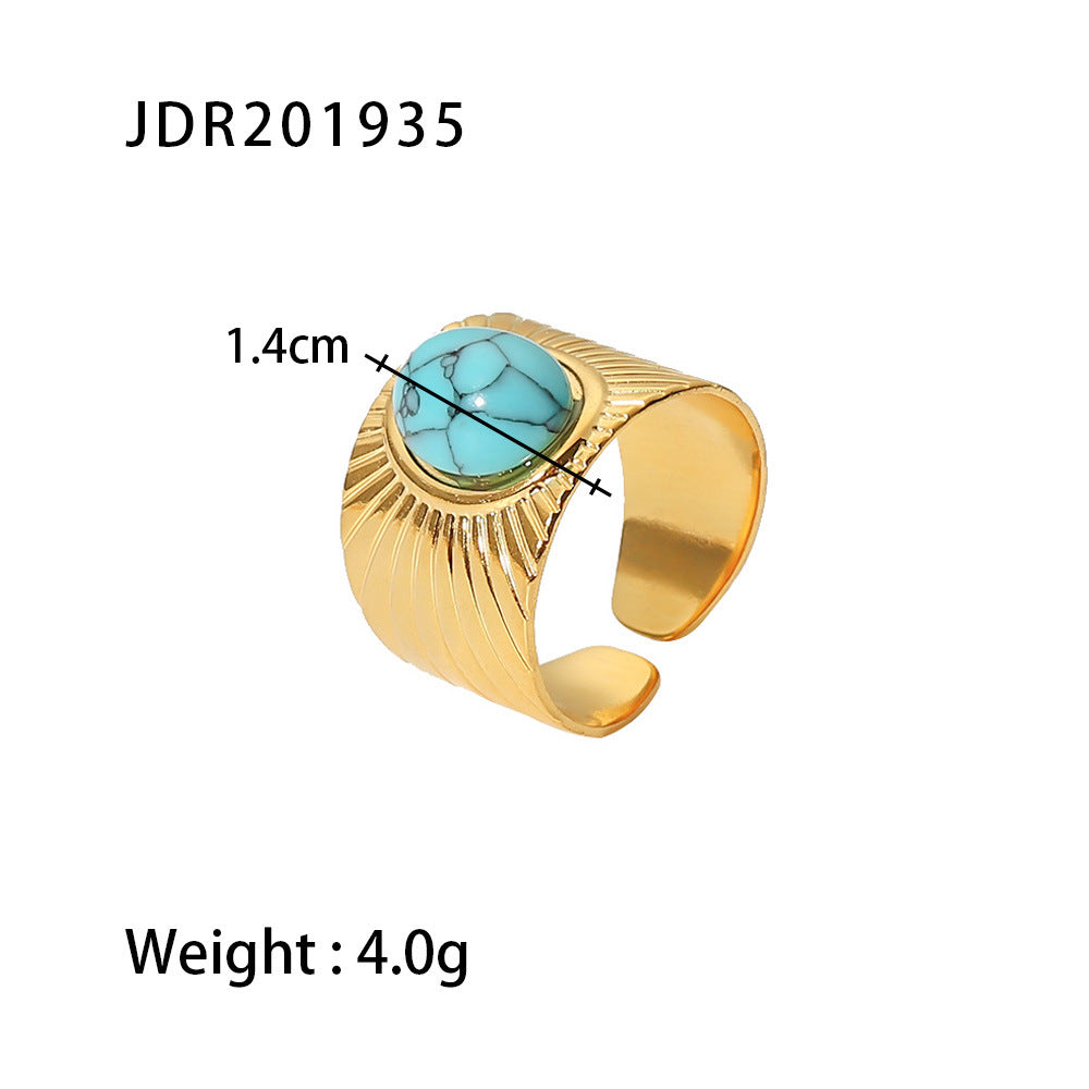 Gold plated gemstone ring with minimalist adjustable band and geometric star detail