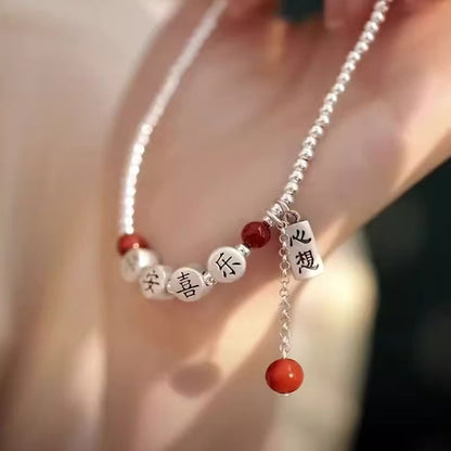 Silver peace happiness anklet with diamond-shaped details and elegant minimalist design