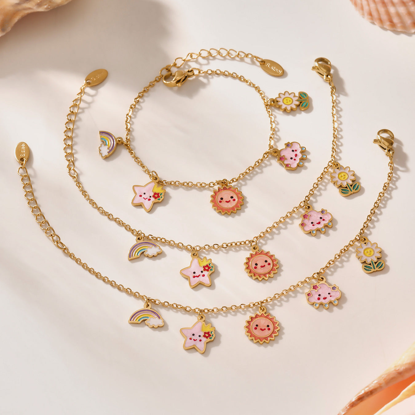 Gold plated kids jewelry set with sun and star necklace and matching bracelet for children