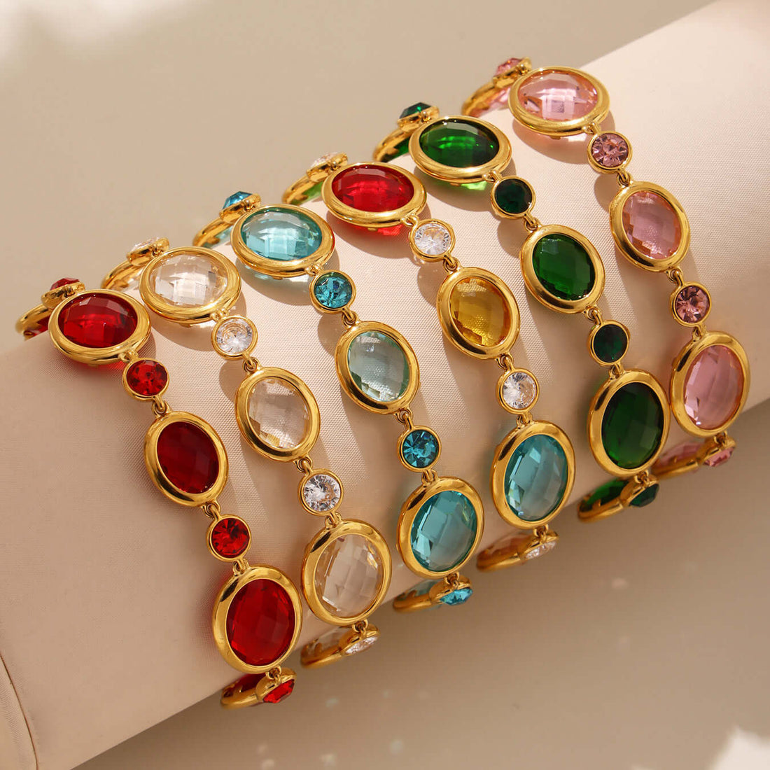 18K gold plated Czech crystal anklet with colorful gemstones in red, green, blue, and pink.
