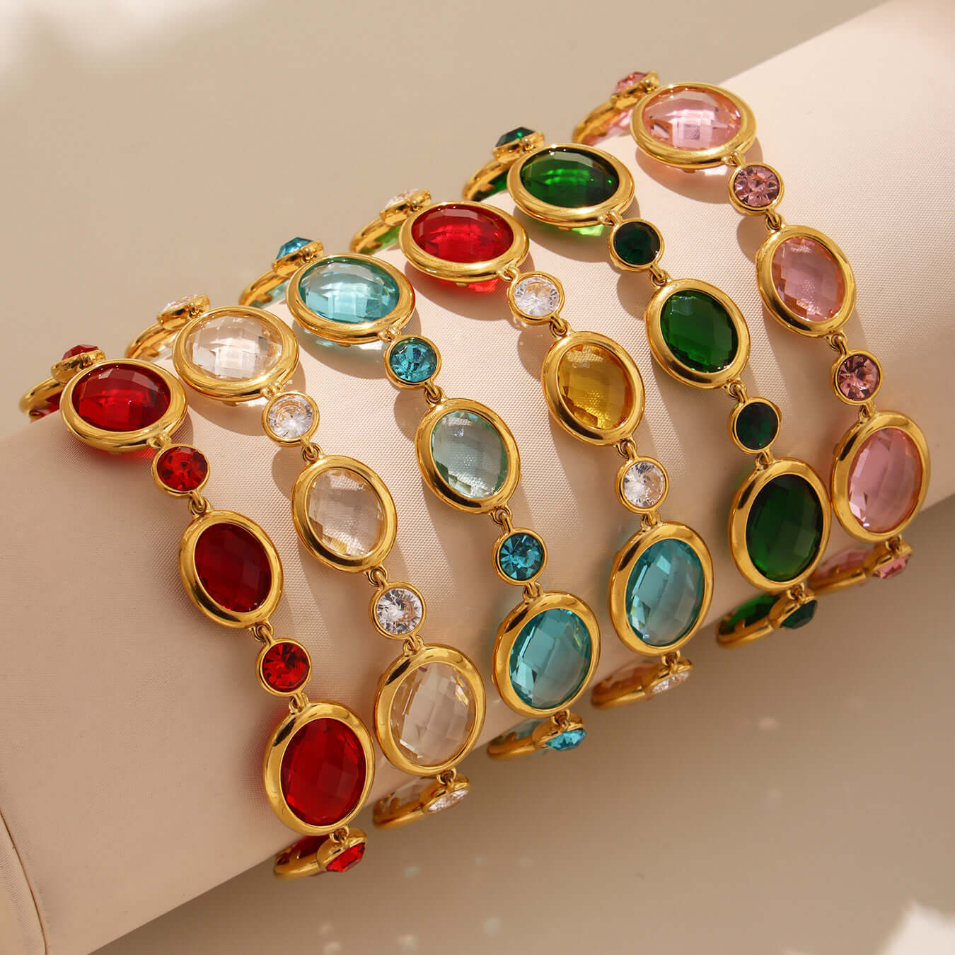 18K gold plated Czech crystal anklet with colorful gemstones in red, green, blue, and pink.