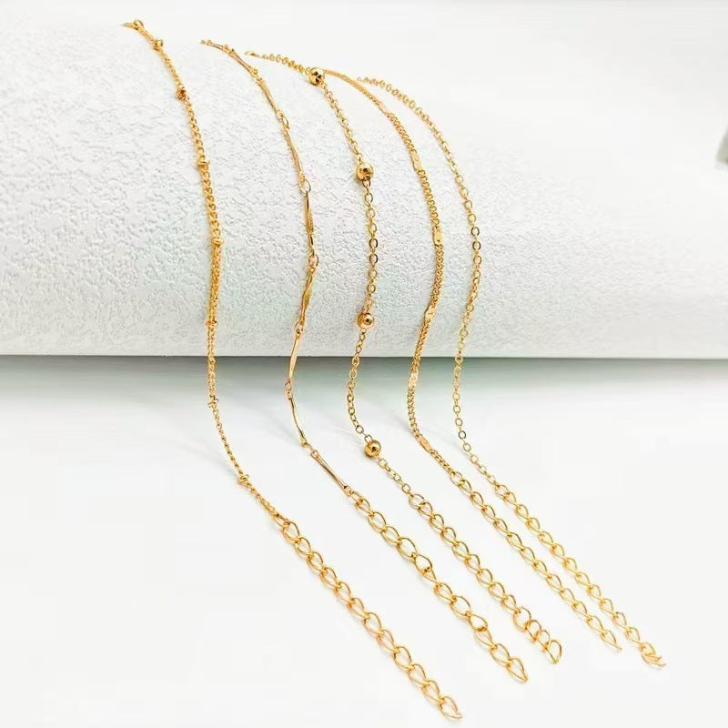 Gold chain anklet set with 5 layered chain styles for beach and minimalist summer fashion