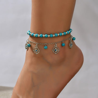 Retro tassel anklet with double-layer chains and ethnic metal pendant details