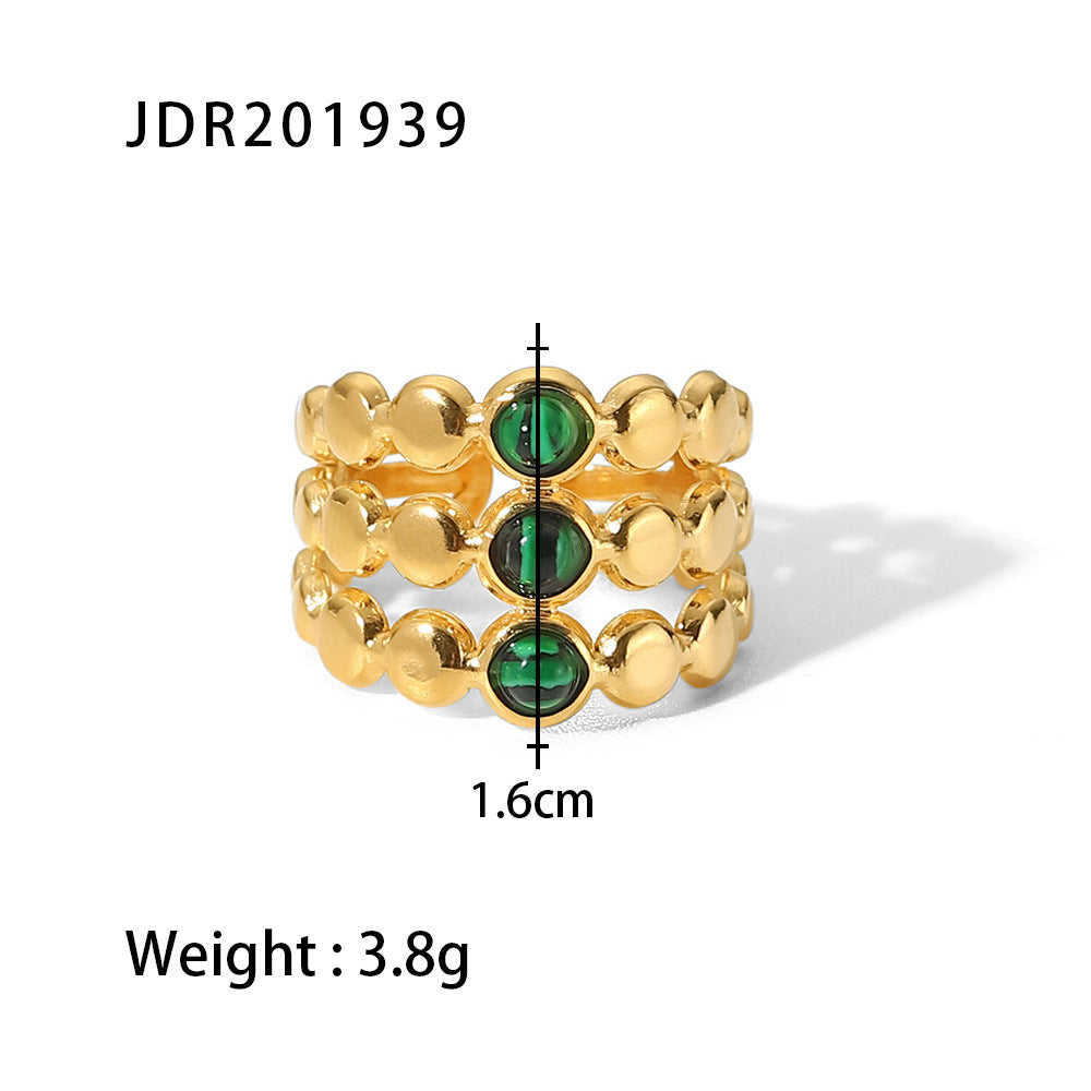 Gold plated gemstone ring with minimalist adjustable band and geometric star detail