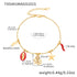 Gold plated ocean charm jewelry set with Ferris wheel necklace, octopus bracelet, turtle zircon pendant, and matching earrings