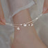 Sterling silver ginkgo leaf anklet with double-layer chain and elegant Korean-inspired design