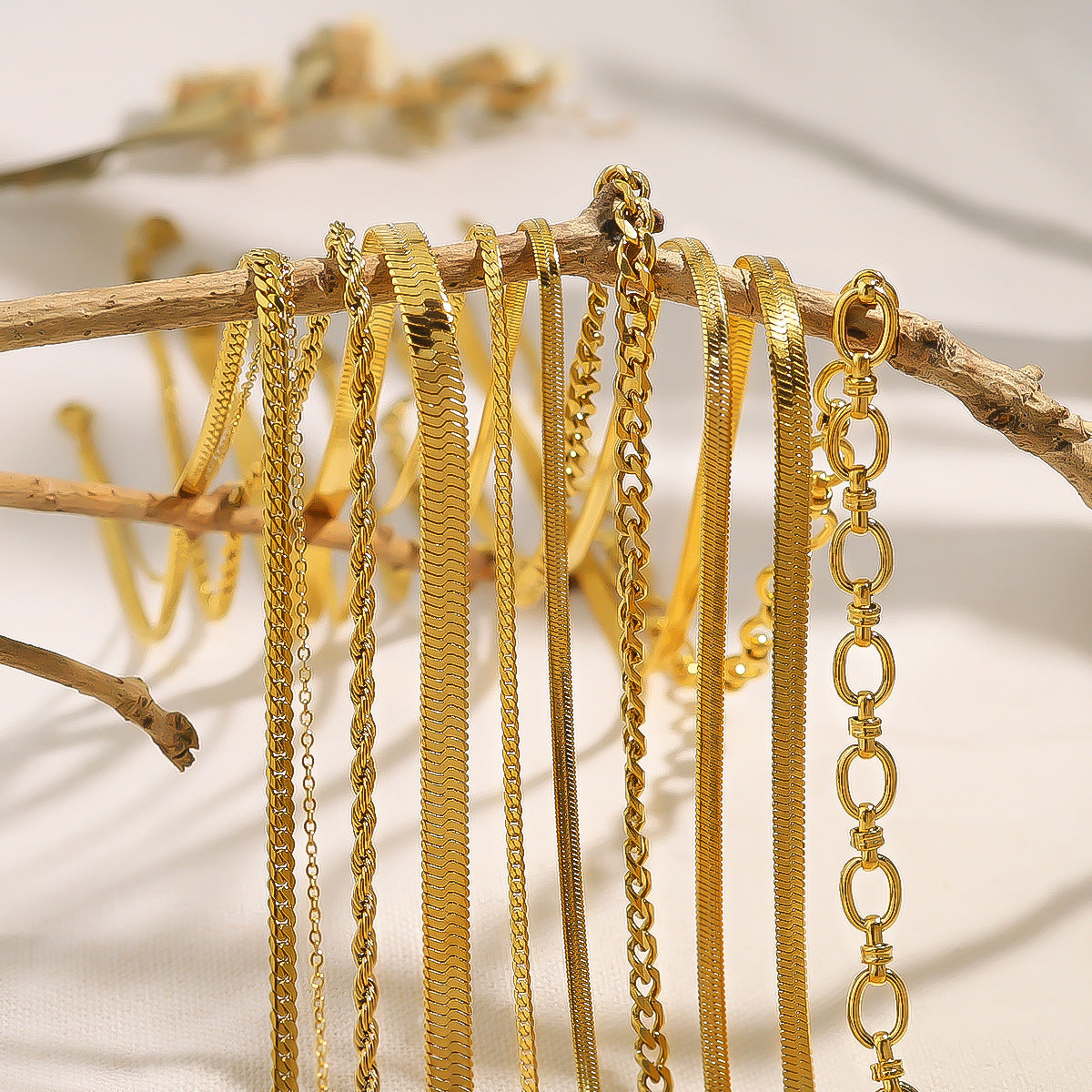 18K gold plated layered necklace with flat snake chain and twist double-layer design