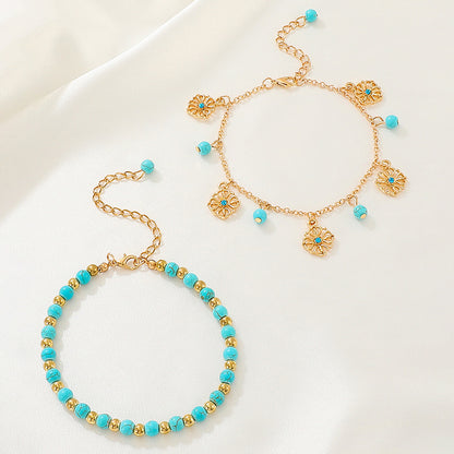 Retro tassel anklet with double-layer chains and ethnic metal pendant details