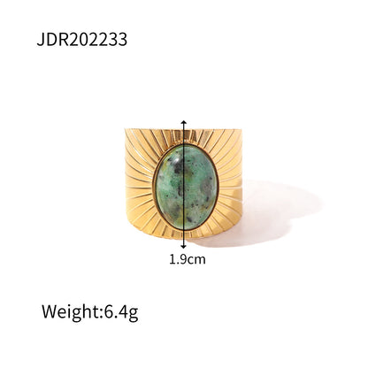 Gold plated gemstone ring with minimalist adjustable band and geometric star detail