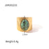 Gold plated gemstone ring with minimalist adjustable band and geometric star detail