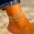 Gold chain anklet set with 5 layered chain styles for beach and minimalist summer fashion