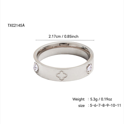 Gold plated clover heart ring set with stackable geometric stainless steel design