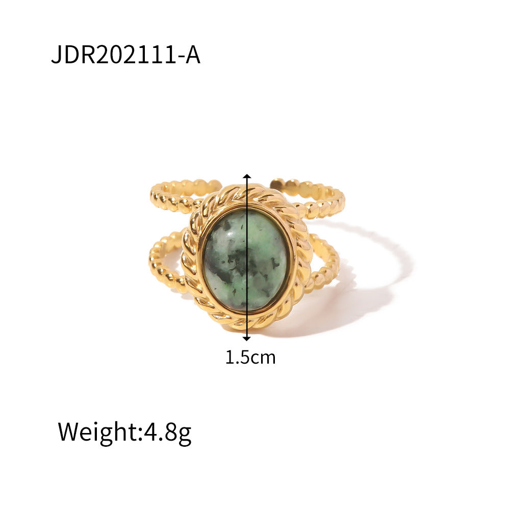 Gold plated gemstone ring with minimalist adjustable band and geometric star detail