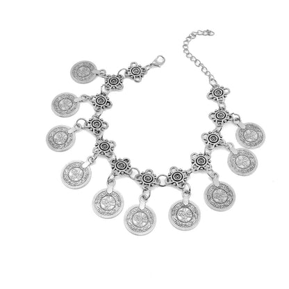 Bohemian coin tassel anklet with retro coin charms and flowing tassels for beach and festival styling