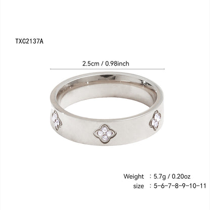 Gold plated clover heart ring set with stackable geometric stainless steel design