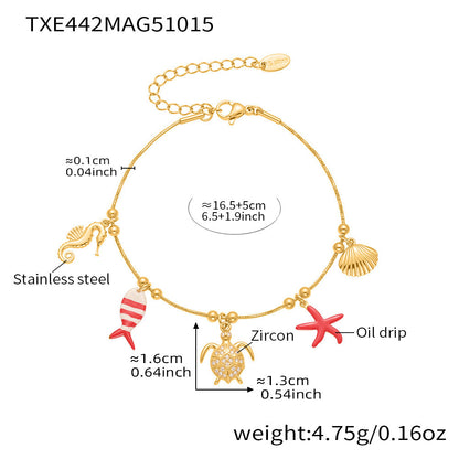 Gold plated ocean charm jewelry set with Ferris wheel necklace, octopus bracelet, turtle zircon pendant, and matching earrings