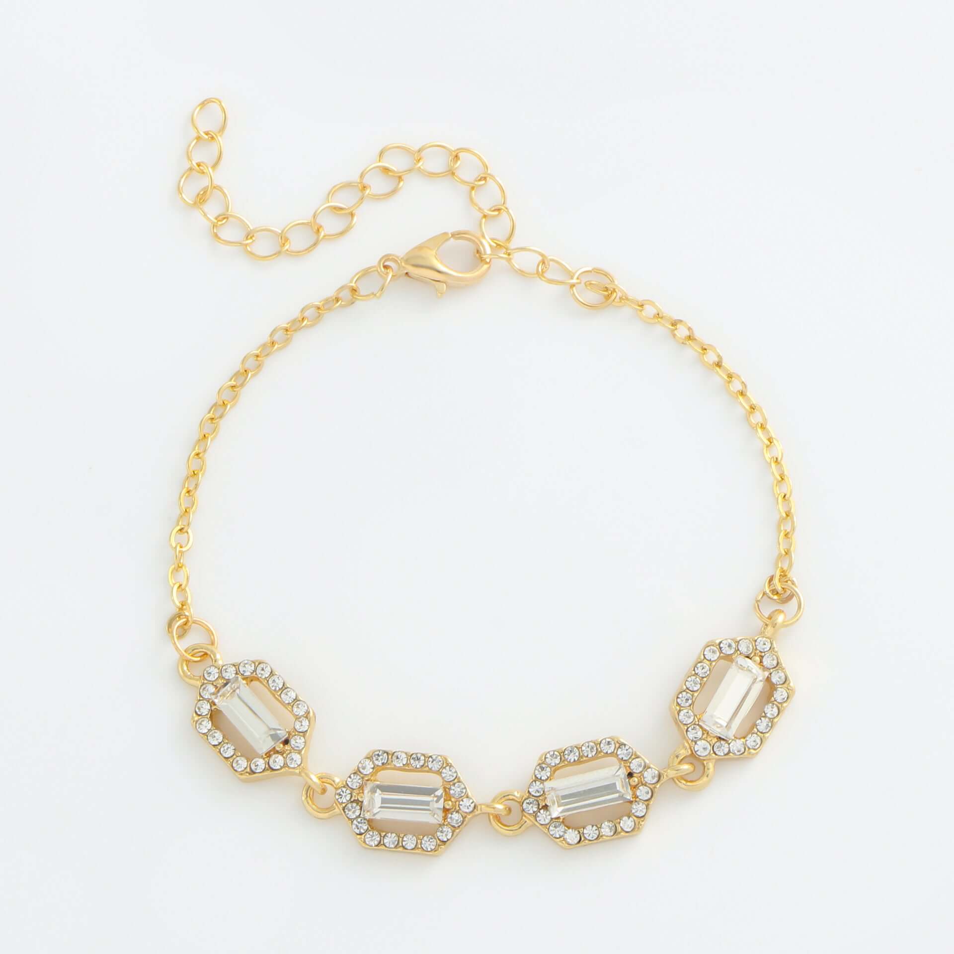 Rhinestone geometric anklet set featuring gold tones and hexagonal designs, ideal for stylish layering and sparkle.