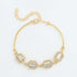 Rhinestone geometric anklet set featuring gold tones and hexagonal designs, ideal for stylish layering and sparkle.