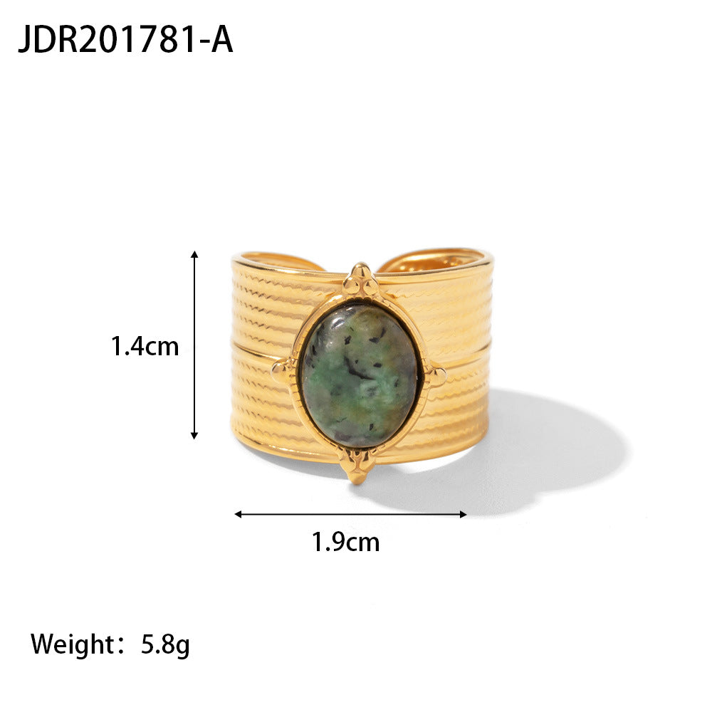 Gold plated gemstone ring with minimalist adjustable band and geometric star detail