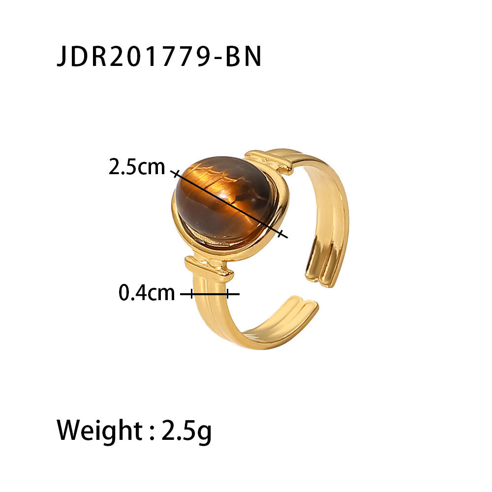 Gold plated gemstone ring with minimalist adjustable band and geometric star detail