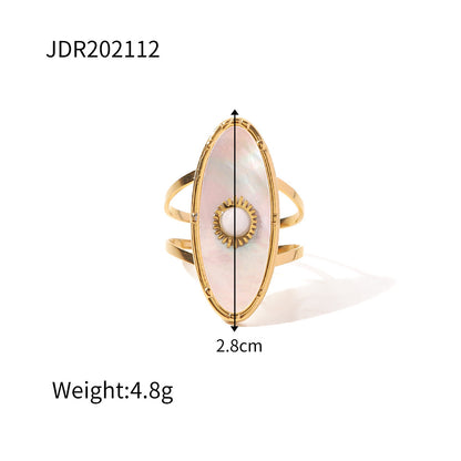 Gold plated gemstone ring with minimalist adjustable band and geometric star detail