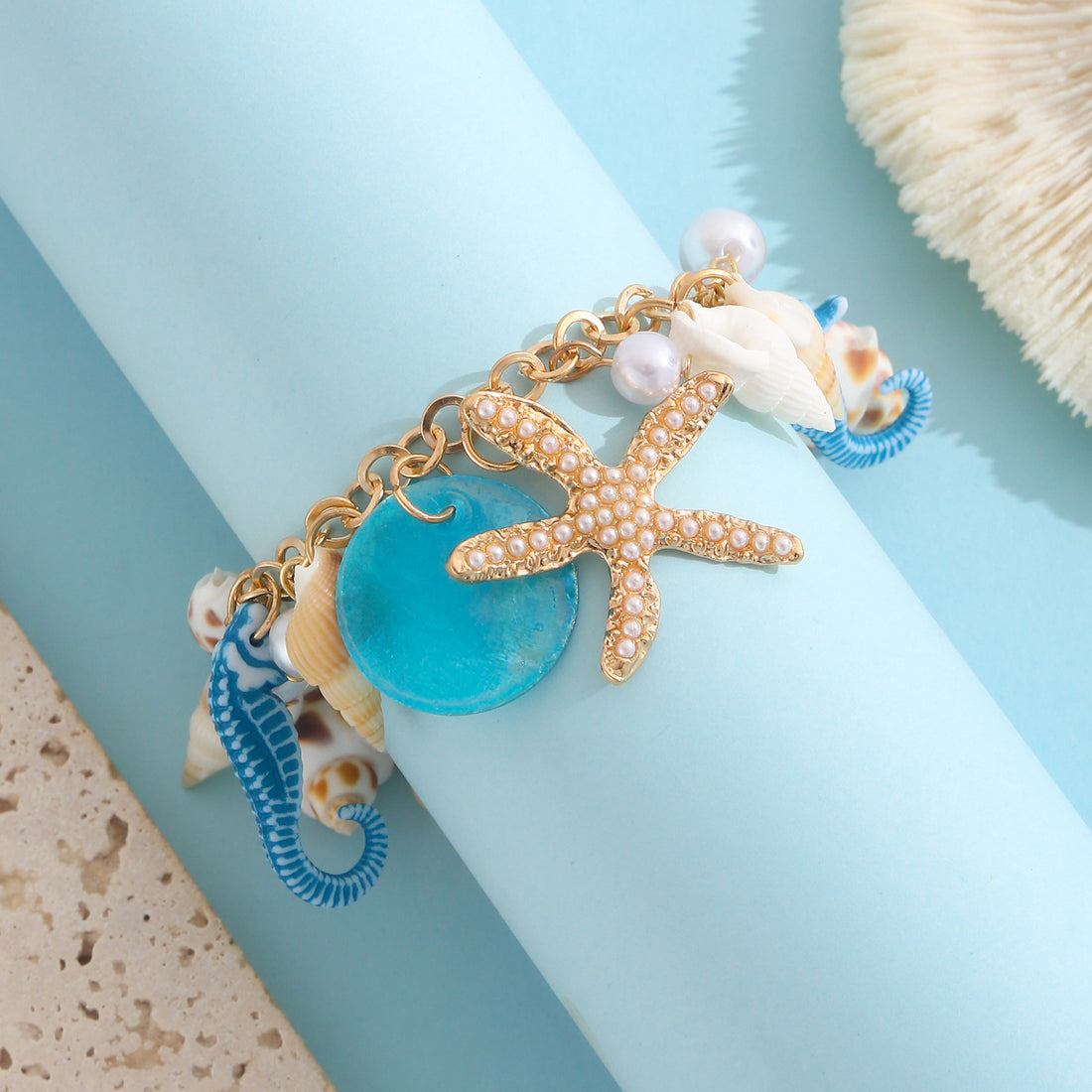 Gold plated beach anklet with starfish and shell charms in bohemian Hawaiian style