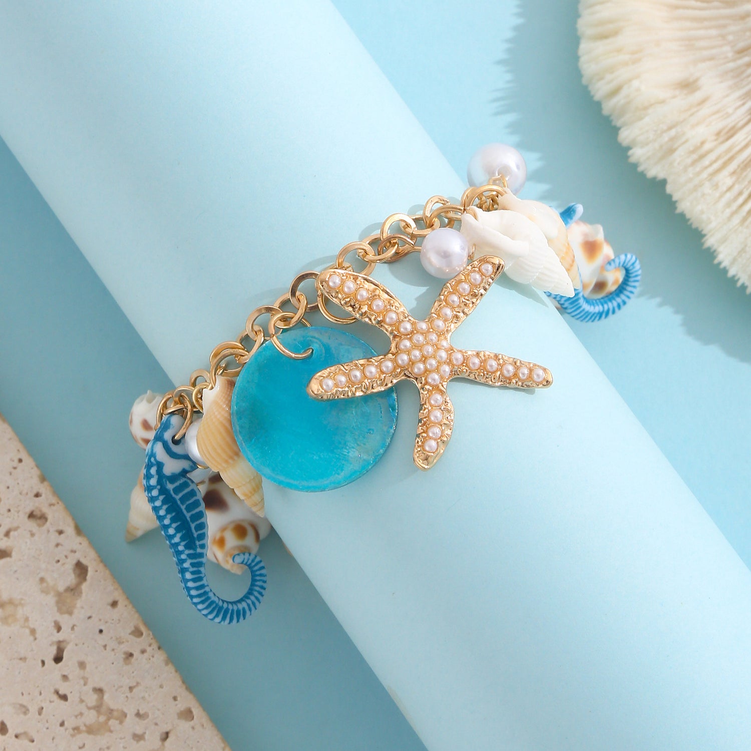 Gold plated beach anklet with starfish and shell charms in bohemian Hawaiian style