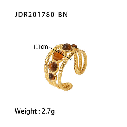 Gold plated gemstone ring with minimalist adjustable band and geometric star detail