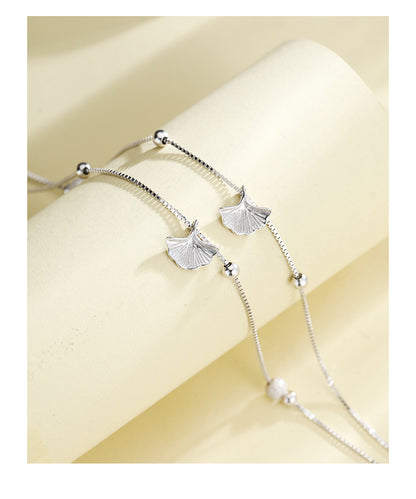 Sterling silver ginkgo leaf anklet with double-layer chain and elegant Korean-inspired design