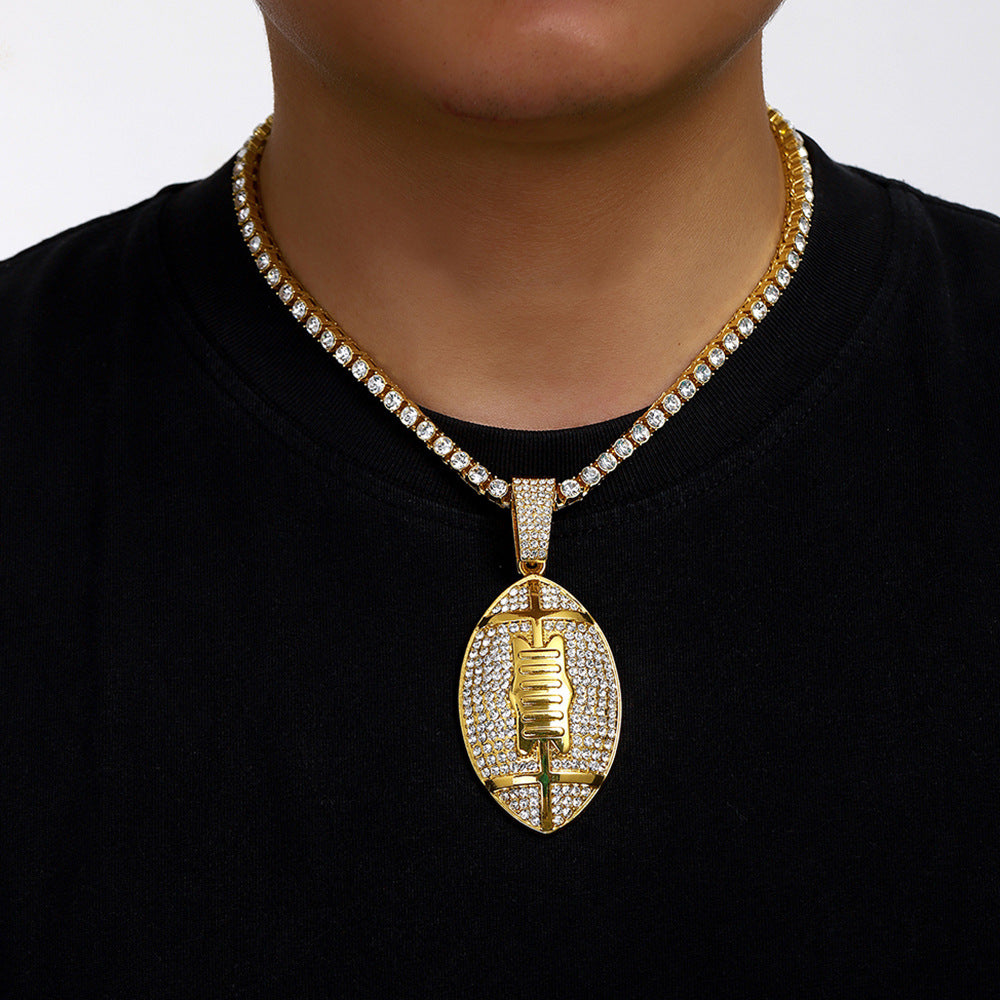 Gold plated football pendant necklace with iced out rhinestone design and hip hop chain style