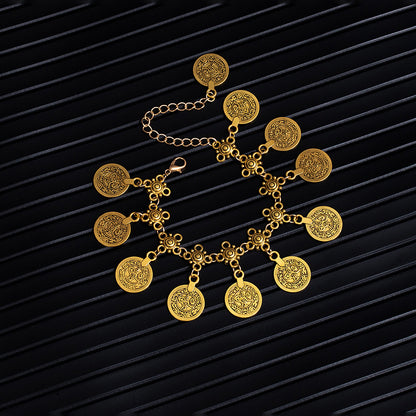 Bohemian coin tassel anklet with retro coin charms and flowing tassels for beach and festival styling