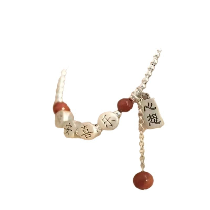Silver peace happiness anklet with diamond-shaped details and elegant minimalist design