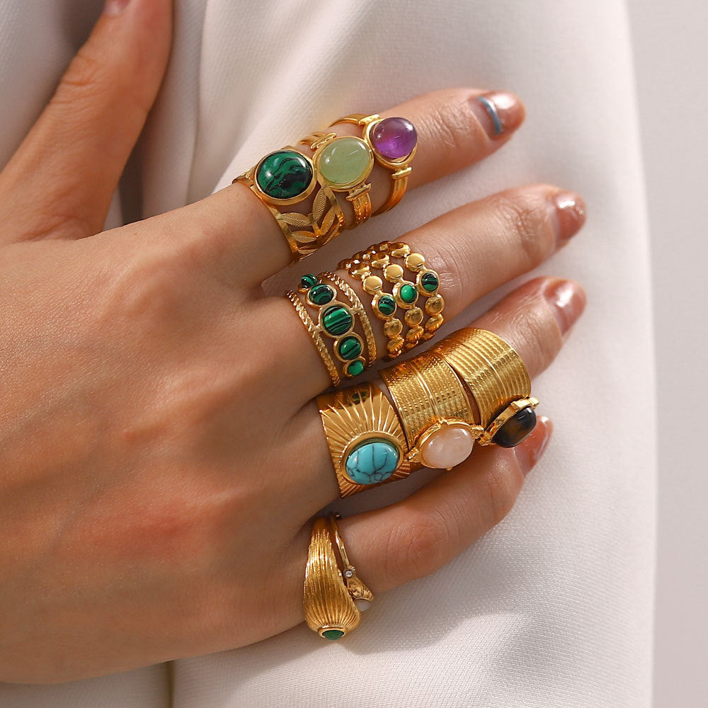 Gold plated gemstone ring with minimalist adjustable band and geometric star detail