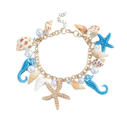 Gold plated beach anklet with starfish and shell charms in bohemian Hawaiian style